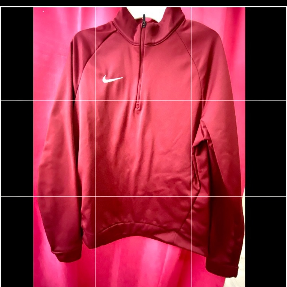Nike tech sweatshirt.